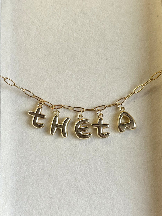 theta necklace