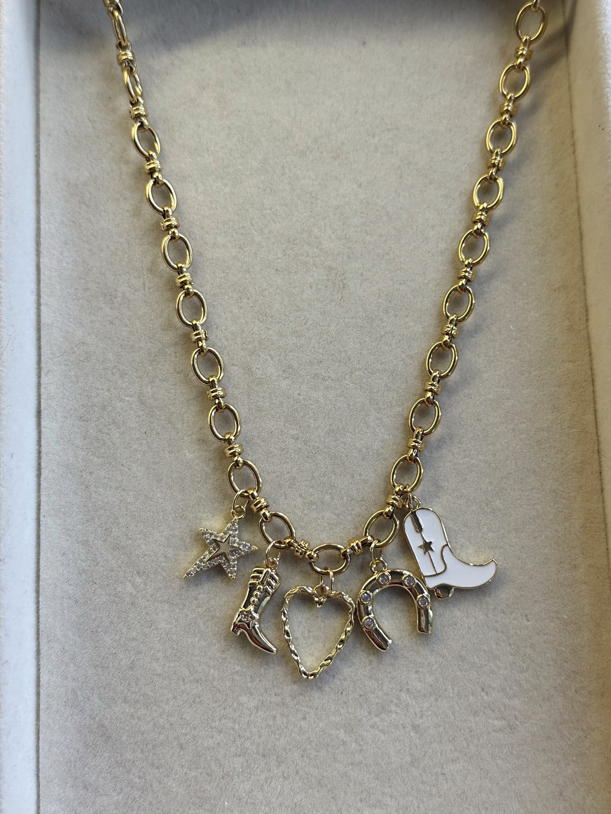 bold link necklace with country theme charms